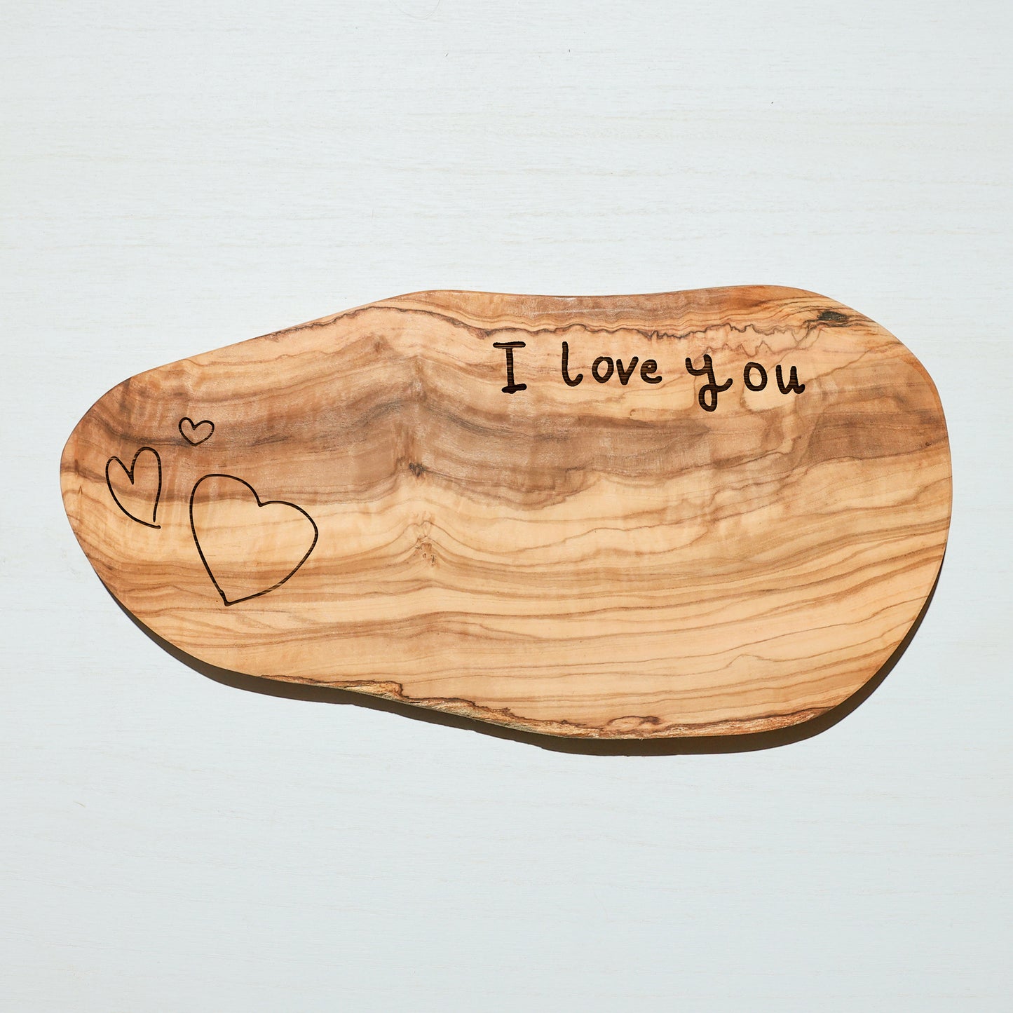 OLIVE WOOD CUTTING BOARD (IRREGULAR OVAL)